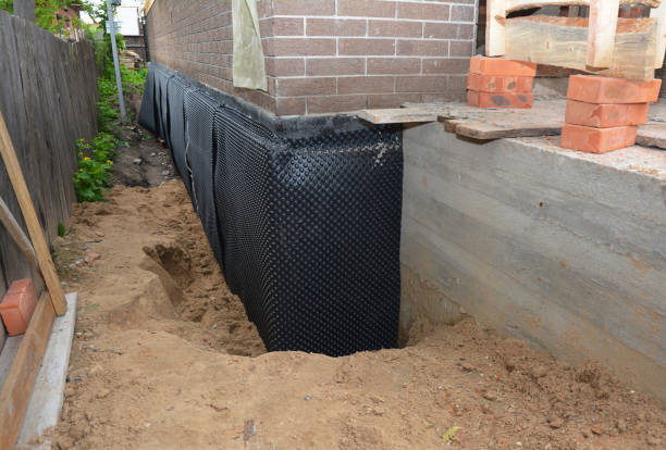 SJ Waterproofing Pros technician performing targeted Sump Pump Installation assessment in Black Creek, WI